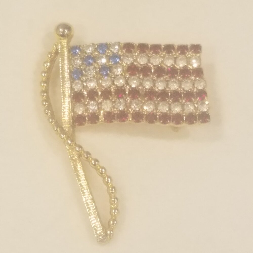 Vintage Rafaelian gold tone American Flag brooch